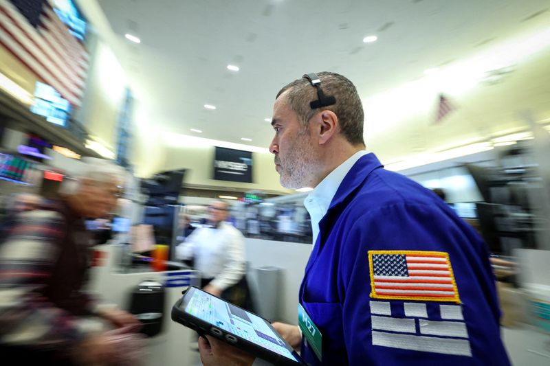 US bank stocks fall as investors weigh credit card rate cap deadline